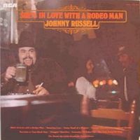 Johnny Russell - She's In Love With A Rodeo Man